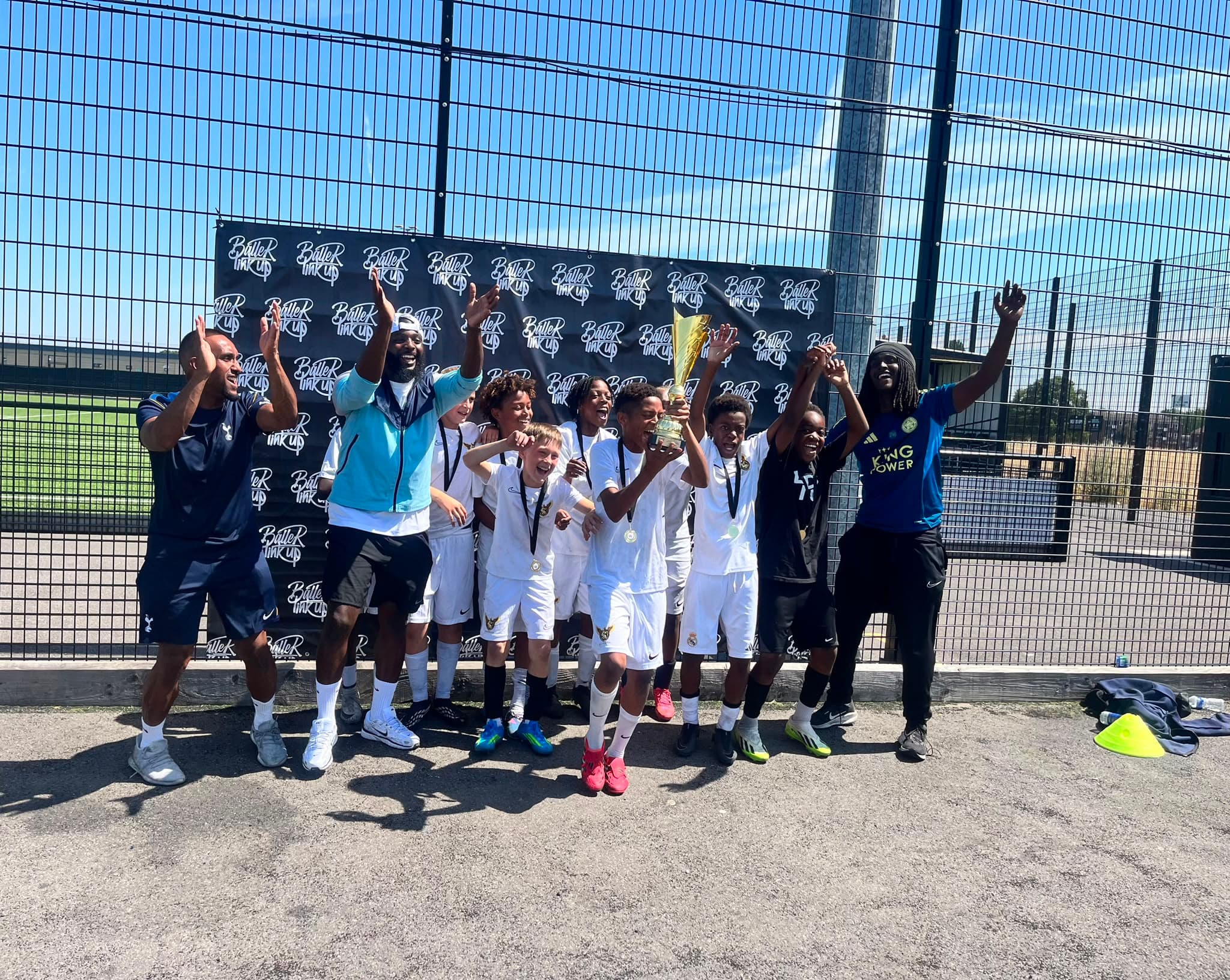 Supreme Showcase U10s lift the trophy — Ballers Link Up champions
